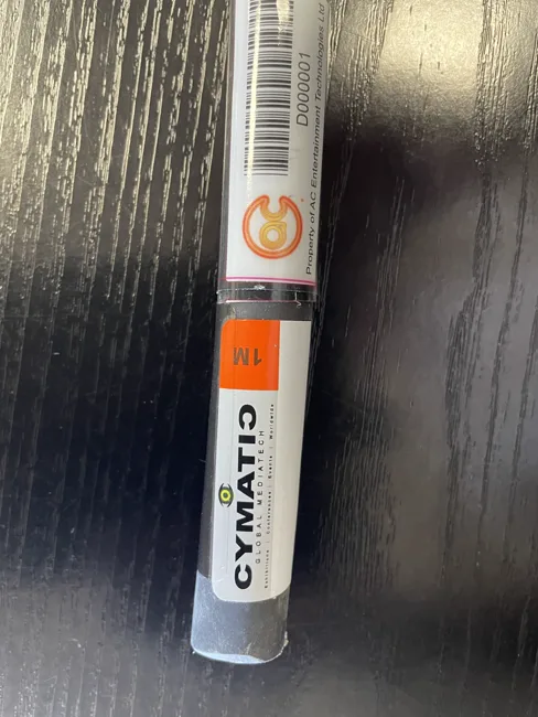 Cable overlay protector label applied to a touring cable — Cymatic Global Mediatech serialised barcode label