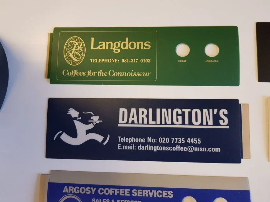 Custom metal ID tags and engraved nameplates manufactured by Adcal Labels