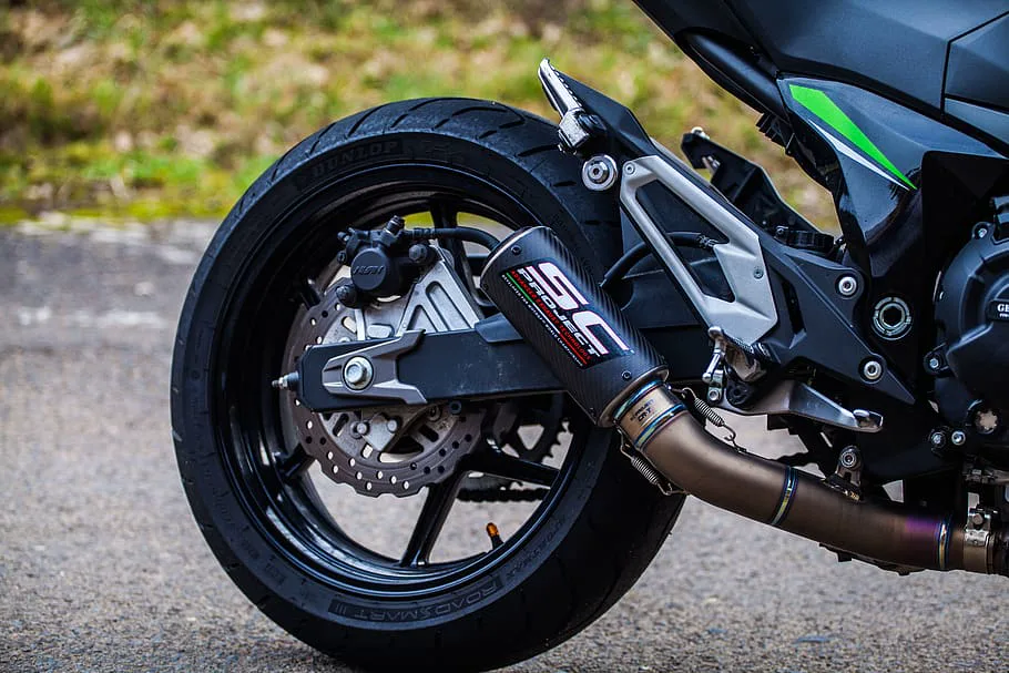 Heat resistant motorcycle exhaust stickers on a titanium SC Project exhaust