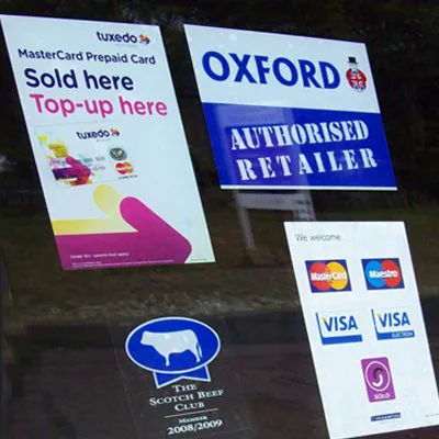 Retail shop window stickers for payment cards and store signage