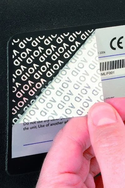 Tamper evident security void label showing VOID pattern when peeled